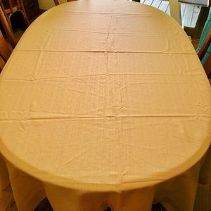 60" x 84" oblong, gold, hotel/restaurant supply oblong tablecloth. Like New